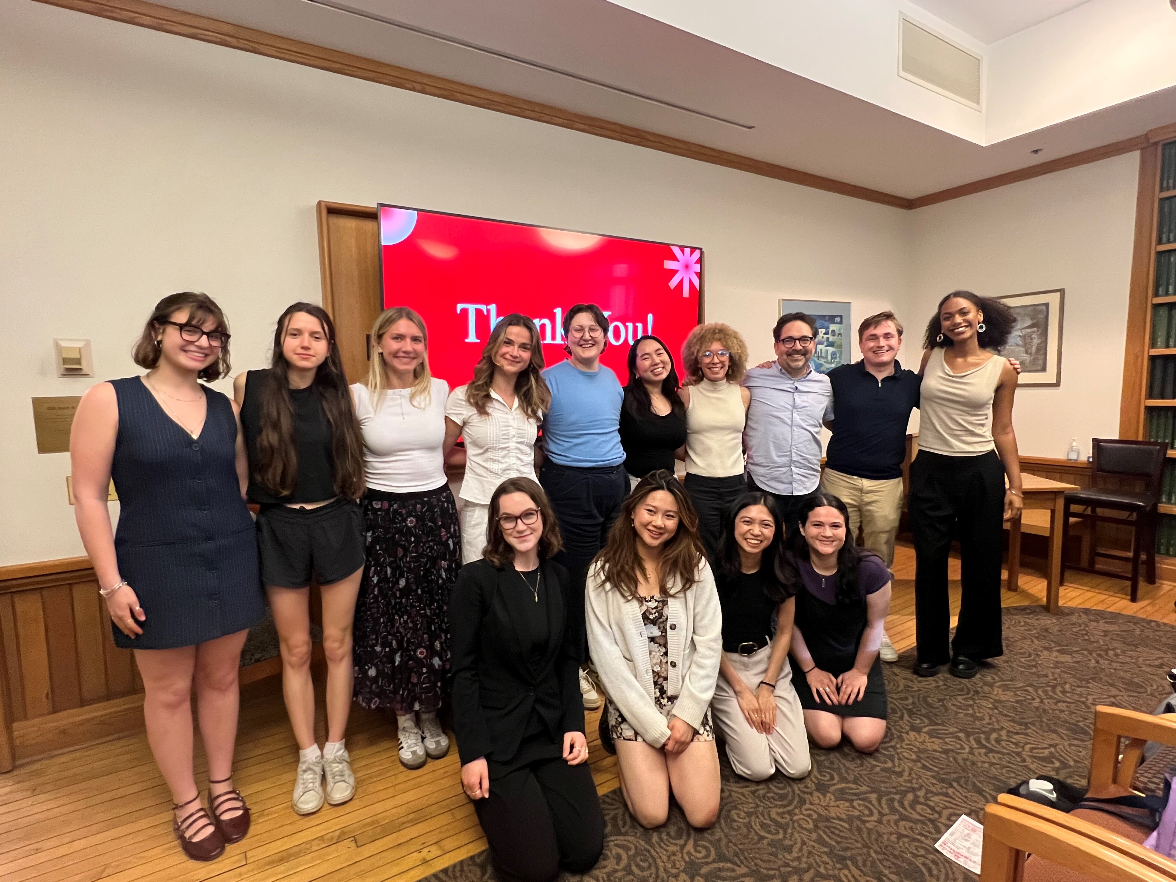 Professor and Seniors at Senior Symposium